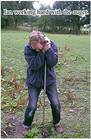 Twisting the auger required a lot of force as the ground was hard in the summer.  The auger is shaped rather like a giant corkscrew.